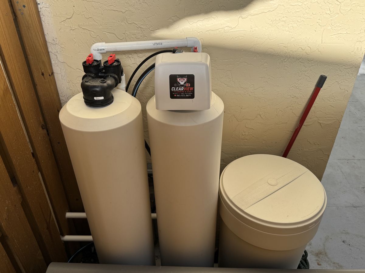 Clearview-installed water filter and water softener with brine tank