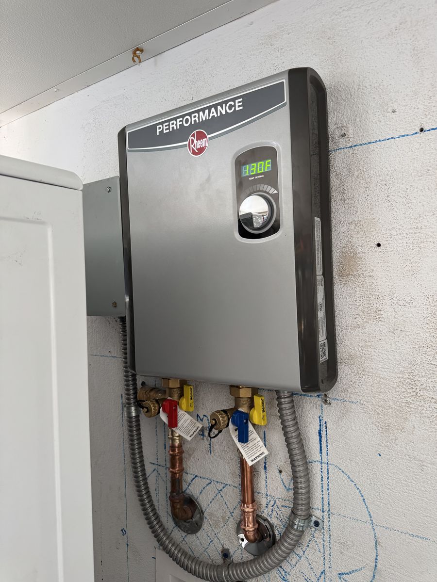 Rheem Performance tankless water heater with labeled shutoff valves
